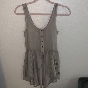 Very cute tan colored button up tank top/vest from buckle